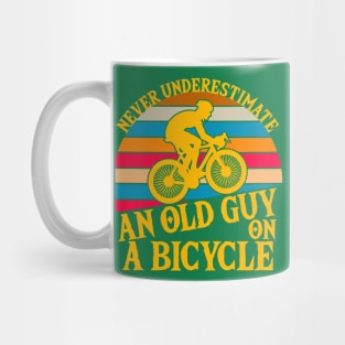 Never Underestimate An old Guy On A Bicycle Vintage Mug